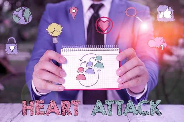 心臓発作を示すメモを書く。死亡につながる冠状動脈血栓症の突然の発生を示すビジネス写真. — ストック写真