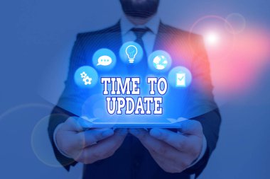 Güncelleştirme Zamanı'nı gösteren kavramsal el yazısı. İş fotoğraf metin bu doğru zaman bir şey daha modern yeni yapmaktır.