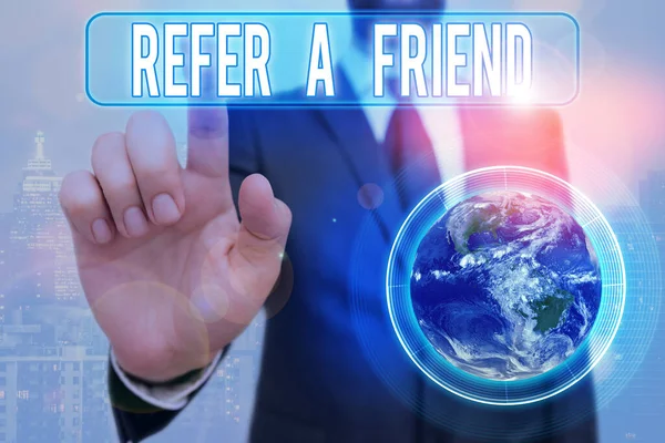 Writing note showing Refer A Friend. Business photo showcasing direct someone to another or send him something like gift Elements of this image furnished by NASA. — Stock Photo, Image