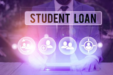 Öğrenci kredisi yazan el yazısı. Konsept, öğrencilerin okul parasını ödemelerine yardımcı olmak için tasarlanmış mali yardım anlamına gelir.