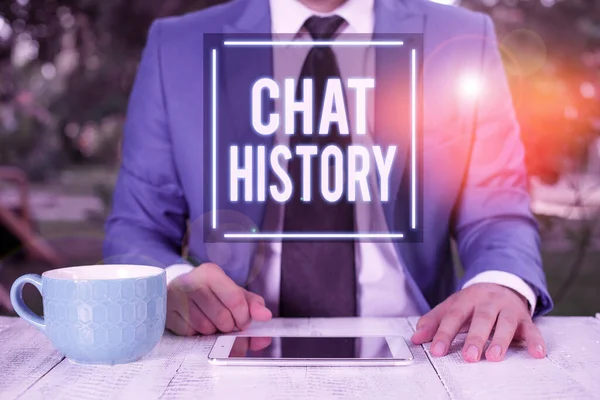 Writing note showing Chat History. Business photo showcasing archive of transcripts from online chat and instant messaging Businessman with pointing finger in front of him.