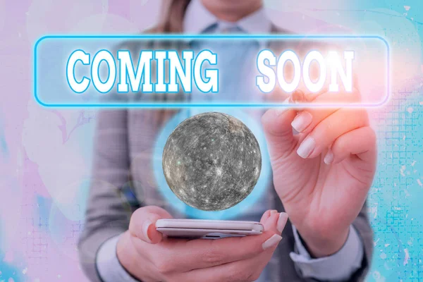 Text sign showing Coming Soon. Conceptual photo something is going to happen soon or after a short time Elements of this image furnished by NASA. — 스톡 사진