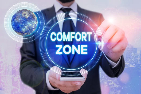 Handwriting text Comfort Zone. Concept meaning place or situation where one feels safe and without stress Elements of this image furnished by NASA.