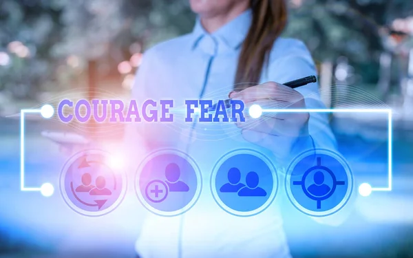 Writing note showing Courage Fear. Business photo showcasing quality of mind that enables a demonstrating to face difficulty.