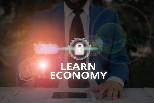 Signo de texto que muestra Learn Economy. Ganancia conceptual de la foto o adquirir conocimientos en el sistema de comercio e industria . —  Fotos de Stock