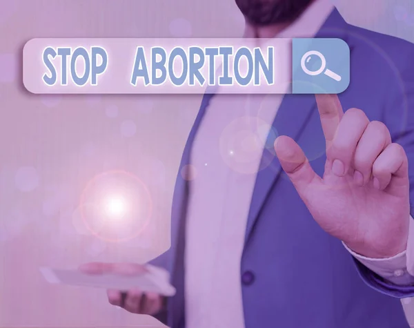 การเขียนด้วยมือในแนวคิดแสดงให้เห็นถึงการหยุดการทําแท้ง ข้อความภาพถ่ายธุรกิจเพื่อหยุดกระบวนการทางการแพทย์ที่ใช้ในการยุติการตั้งครรภ์ . — ภาพถ่ายสต็อก