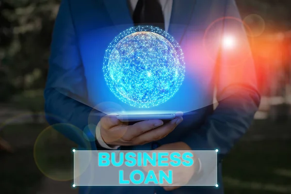 Writing note showing Business Loan. Business photo showcasing Loans provided to small businesses for various purposes Elements of this image furnished by NASA.
