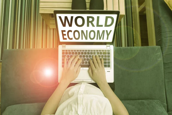 Conceptual hand writing showing World Economy. Business photo showcasing way in which countries economy have been emerging to operate. — Stock Photo, Image