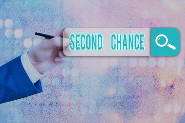 İkinci Şans 'ı gösteren kavramsal el yazısı. Bir kez başarısız olduktan sonra tekrar bir şey denemek için iş fotoğrafı gösterme fırsatı.