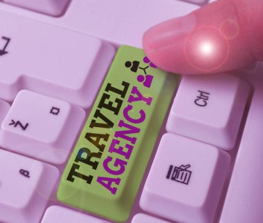 El yazısı Seyahat Ajansı. Seyahat edenler için gerekli düzenlemeleri yapan bir kurum..