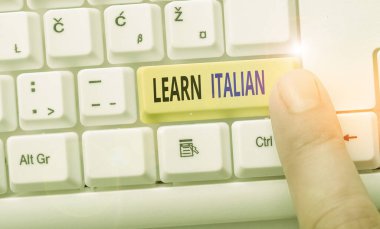 Word writing text Learn Italian. Business concept for gain or acquire knowledge of speaking and writing Italian.