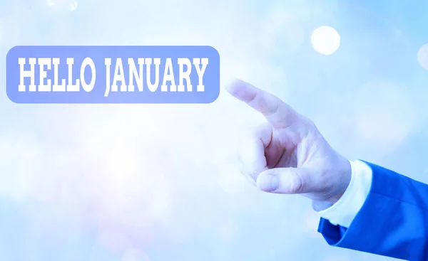 Escribir texto a mano Hola Enero. Concepto que significa un saludo o una cálida bienvenida al primer mes del año . — Foto de Stock