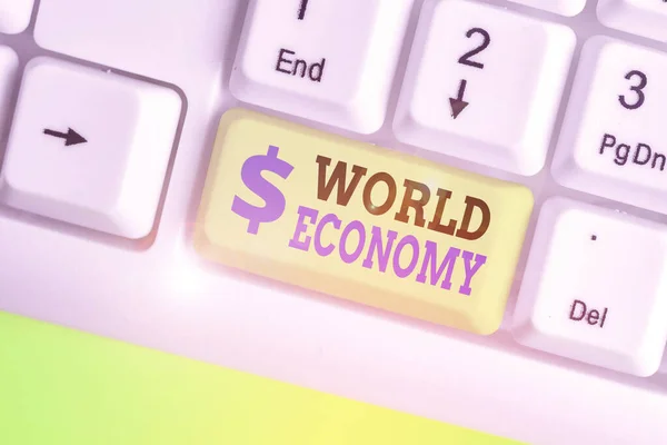 テキストを書く単語世界経済。各国の経済活動のあり方に関するビジネスコンセプト. — ストック写真