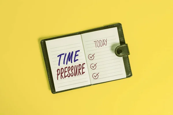 Handwriting text writing Time Pressure. Concept meaning get things done in less time than is needed or desired Dark leather private locked diary striped paper sheets colored background.