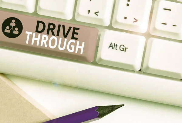 Word writing text Drive Through. Business concept for place where you can get type of service by driving through it.