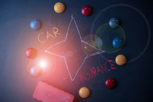 Handwriting text Car Insurance. Concept meaning protection against financial loss in the event of an accident Round Flat shape stones with one eraser stick to old chalk black board. — Stock Photo, Image