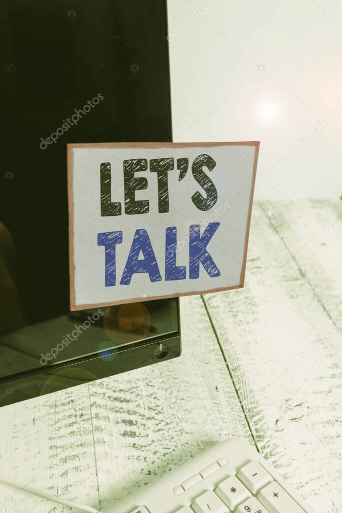 Conceptual hand writing showing Let Talk. Business photo text to discuss something honestly and directly such as plan Notation paper computer monitor screen near white keyboard.