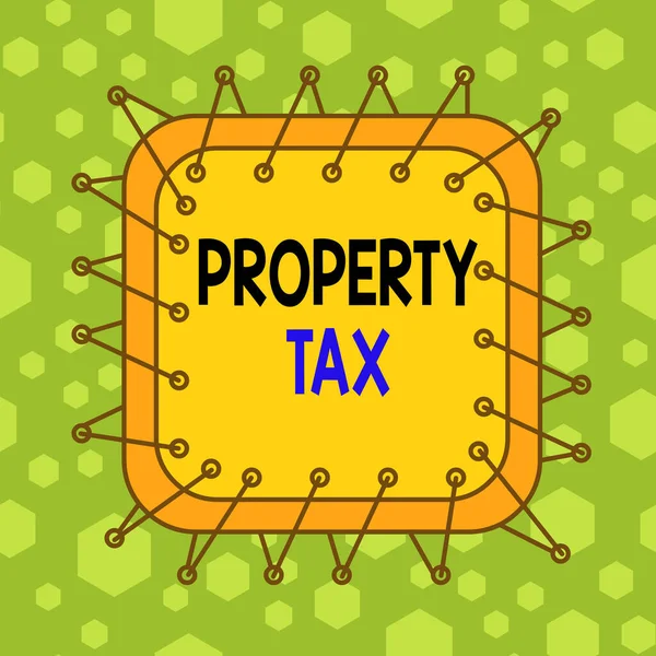 Writing note showing Property Tax. Business photo showcasing an ad valorem tax on the value of a property Millage rate Asymmetrical uneven shaped pattern object multicolour design.