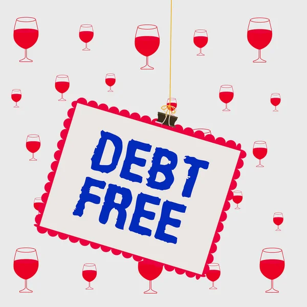 Text sign showing Debt Free. Conceptual photo does not owning any money to any individual or companies Stamp stuck binder clip paper clips square color frame rounded tip sticker.