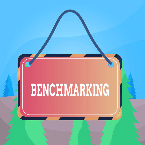 Word writing text Benchmarking. Business concept for evaluate something by comparison with standard or scores Board attached string color black yellow frame empty blank rectangle shape.