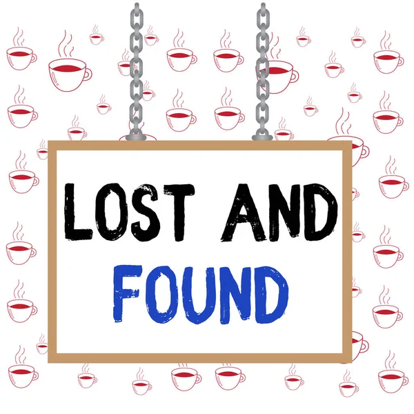 Writing note showing Lost And Found. Business photo showcasing a place where lost items are stored until they reclaimed Whiteboard rectangle frame attached surface chain panel.