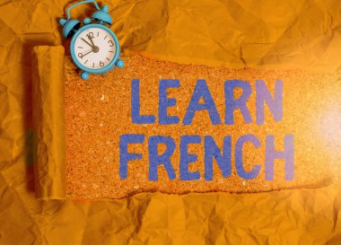 Handwriting text writing Learn French. Concept meaning get knowledge or skill in speaking and writing French language. clipart