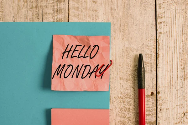 Text sign showing Hello Monday. Conceptual photo greetings or welcoming the first day of the work week Wrinkle paper and cardboard plus stationary placed above wooden background. — Stock Photo, Image