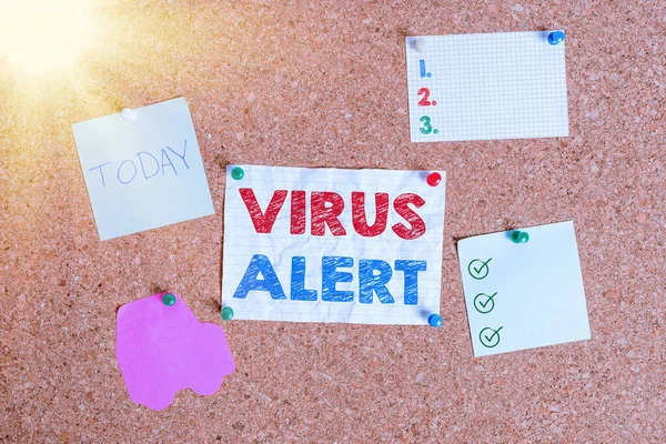 Handwriting text writing Virus Alert. Concept meaning message warning of a nonexistent computer virus threat Corkboard color size paper pin thumbtack tack sheet billboard notice board.