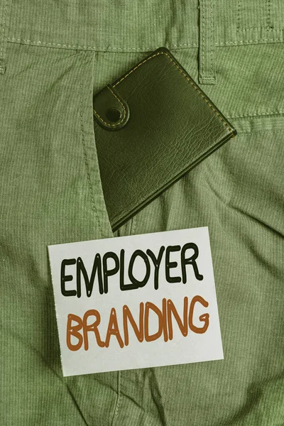 Writing note showing Employer Branding. Business photo showcasing promoting company employer choice to desired target group Small wallet inside trouser front pocket near notation paper.