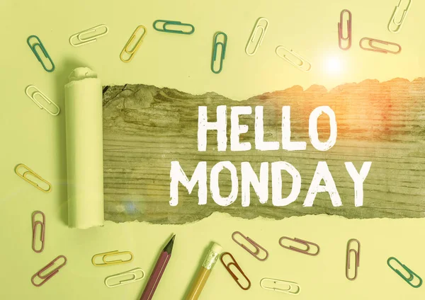 Word writing text Hello Monday. Business concept for greetings or welcoming the first day of the work week.