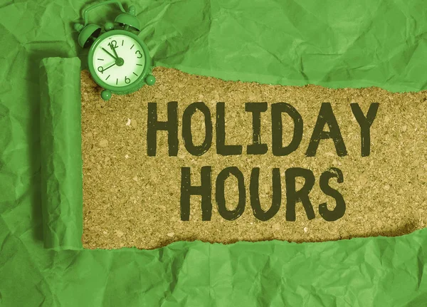 Conceptual hand writing showing Holiday Hours. Business photo showcasing Overtime work on for employees under flexible work schedules. — Stock Photo, Image