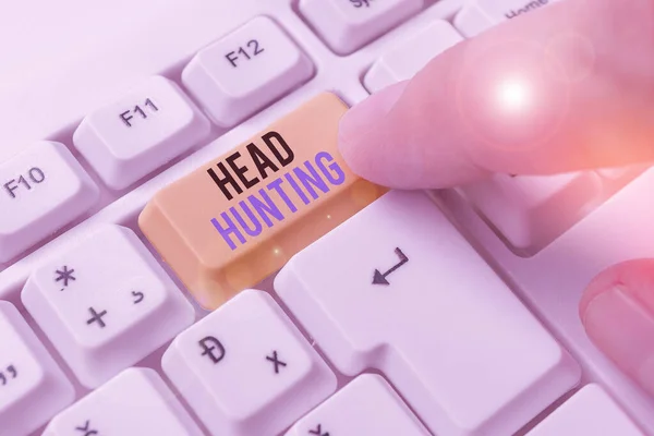 Writing note showing Head Hunting. Business photo showcasing process of recruitment of a prospective or potential employee.