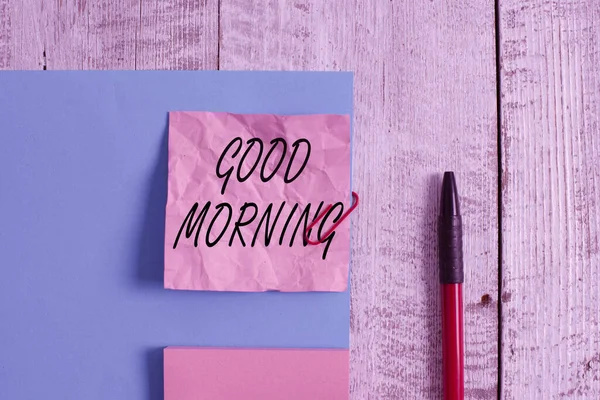 Text sign showing Good Morning. Conceptual photo expressing good wishes on meeting or parting during the morning Wrinkle paper and cardboard plus stationary placed above wooden background. — Stock Photo, Image