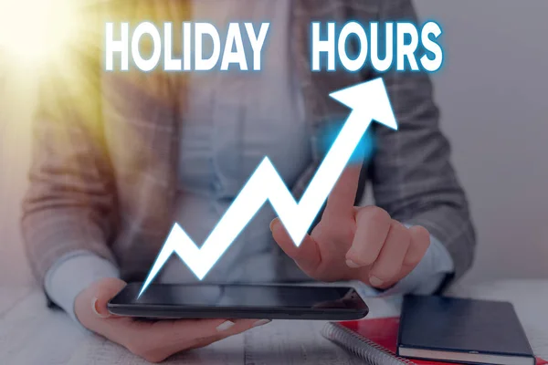 Text sign showing Holiday Hours. Conceptual photo Overtime work on for employees under flexible work schedules.