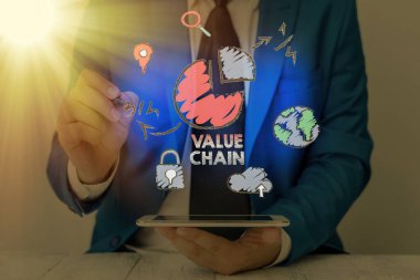 Conceptual hand writing showing Value Chain. Business photo showcasing process or activities by which company adds value to an article.
