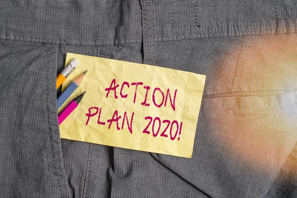 Word writing text Action Plan 2020. Business concept for proposed strategy or course of actions for current year Writing equipment and yellow note paper inside pocket of man work trousers.