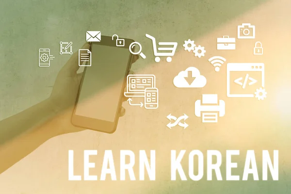 Writing note showing Learn Korean. Business photo showcasing get knowledge or skill in speaking and writing Korean language. — Stok fotoğraf