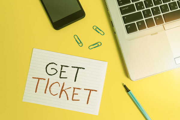 Writing note showing Get Ticket. Business photo showcasing to have printed paper that permits entry to an event or show Trendy laptop smartphone marker paper sheet clips colored background.