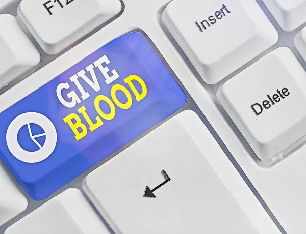 Textová značka "Give Blood". Koncepční fotografie demonstrující dobrovolně byla odebrána a použita pro transfuze. — Stock fotografie