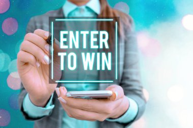 Enter To Win 'i gösteren metin işareti. Kavramsal fotoğraf ödül ya da kazanma şansı karşılığında bir şey takas ediyor..