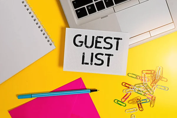 Writing note showing Guest List. Business photo showcasing a list of showing who are allowed to enter the show or an event Laptop marker squared sheet spiral notebook envelope colored background.