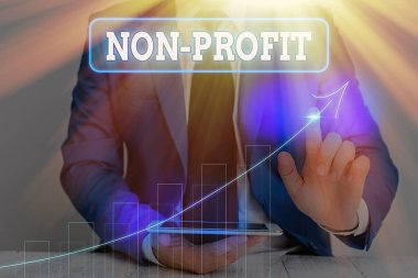 Writing note showing Non Profit. Business photo showcasing type of organization that does not earn profits for its owners.