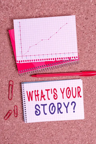 Handwriting text Whats Is Your Storyquestion. Concept meaning manner of asking about past life events Desk notebook paper office cardboard paperboard study supplies table chart.