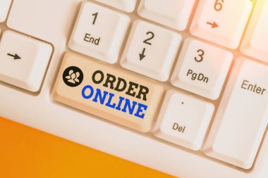 Writing note showing Order Online. Business photo showcasing activity of buying products or services over the Internet.