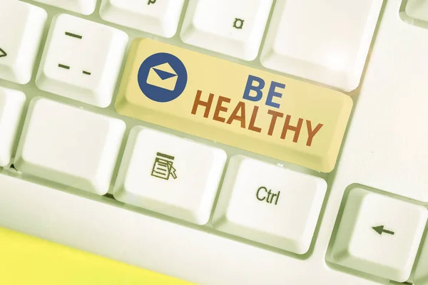 Schrijfbriefje met Be Healthy erop. Zakelijke foto presentatie te zijn krachtig en volledig vrij van lichamelijke of geestelijke ziekten. — Stockfoto