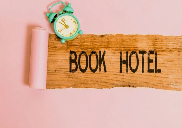 Text sign showing Book Hotel. Conceptual photo an arrangement you make to have a hotel room or accommodation. — Stock Photo, Image