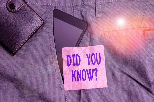 Text sign showing Did You Know Question. Conceptual photo when you are asking someone if they know fact or event Smartphone device inside trousers front pocket with wallet and note paper.