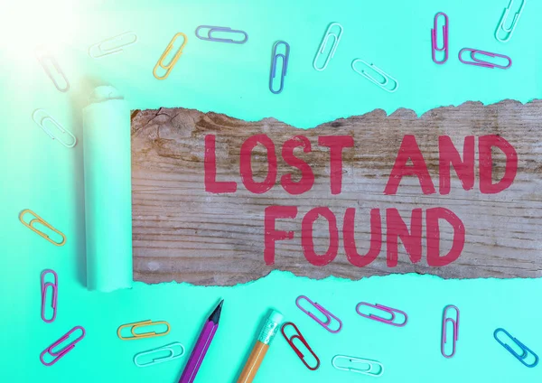 Word writing text Lost And Found. Business concept for a place where lost items are stored until they reclaimed.