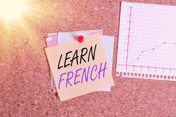 Writing note showing Learn French. Business photo showcasing get knowledge or skill in speaking and writing French language Corkboard size paper thumbtack sheet billboard notice board.