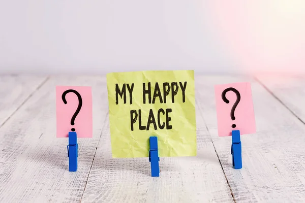 Text sign showing My Happy Place. Conceptual photo something nice has happened or they feel satisfied with life Scribbled and crumbling sheet with paper clips placed on the wooden table.
